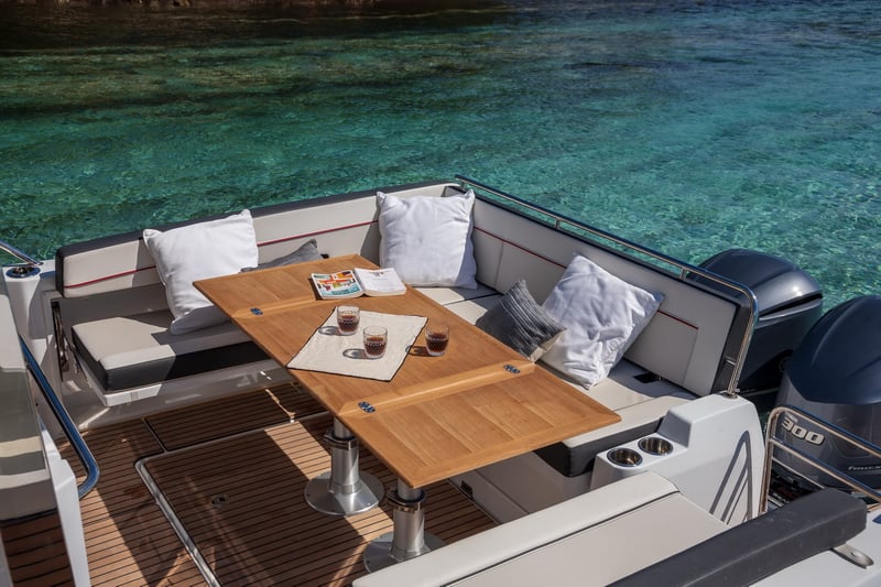 L-shaped aft seating area on Jeanneau Cap Camarat 10.5 WA