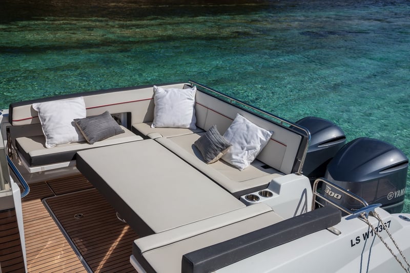 L-shaped aft seating area on Jeanneau Cap Camarat 10.5 WA